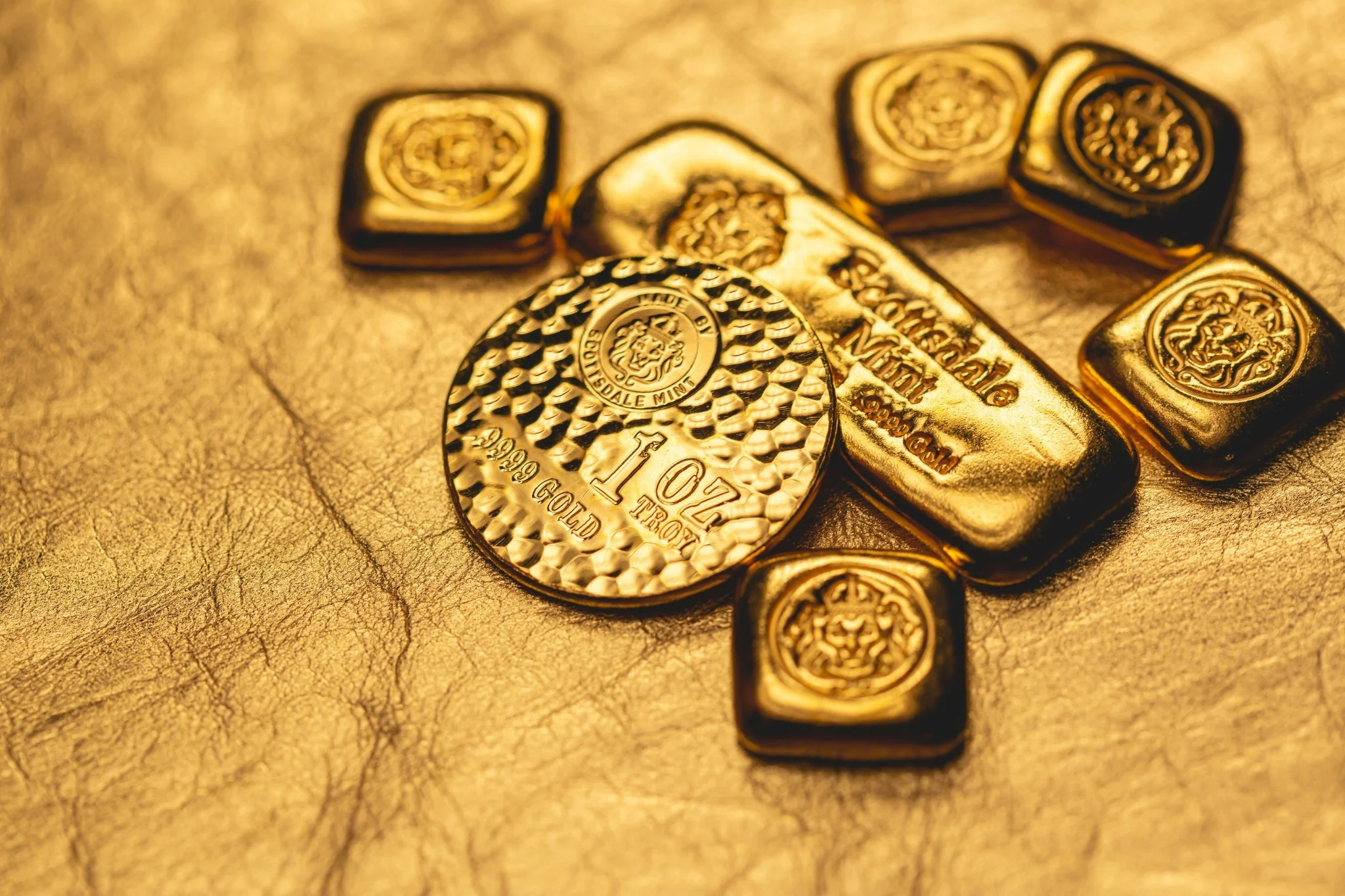 Mix of gold coins representing the recommended crisis-hedge combination of recognizable coins and rounds